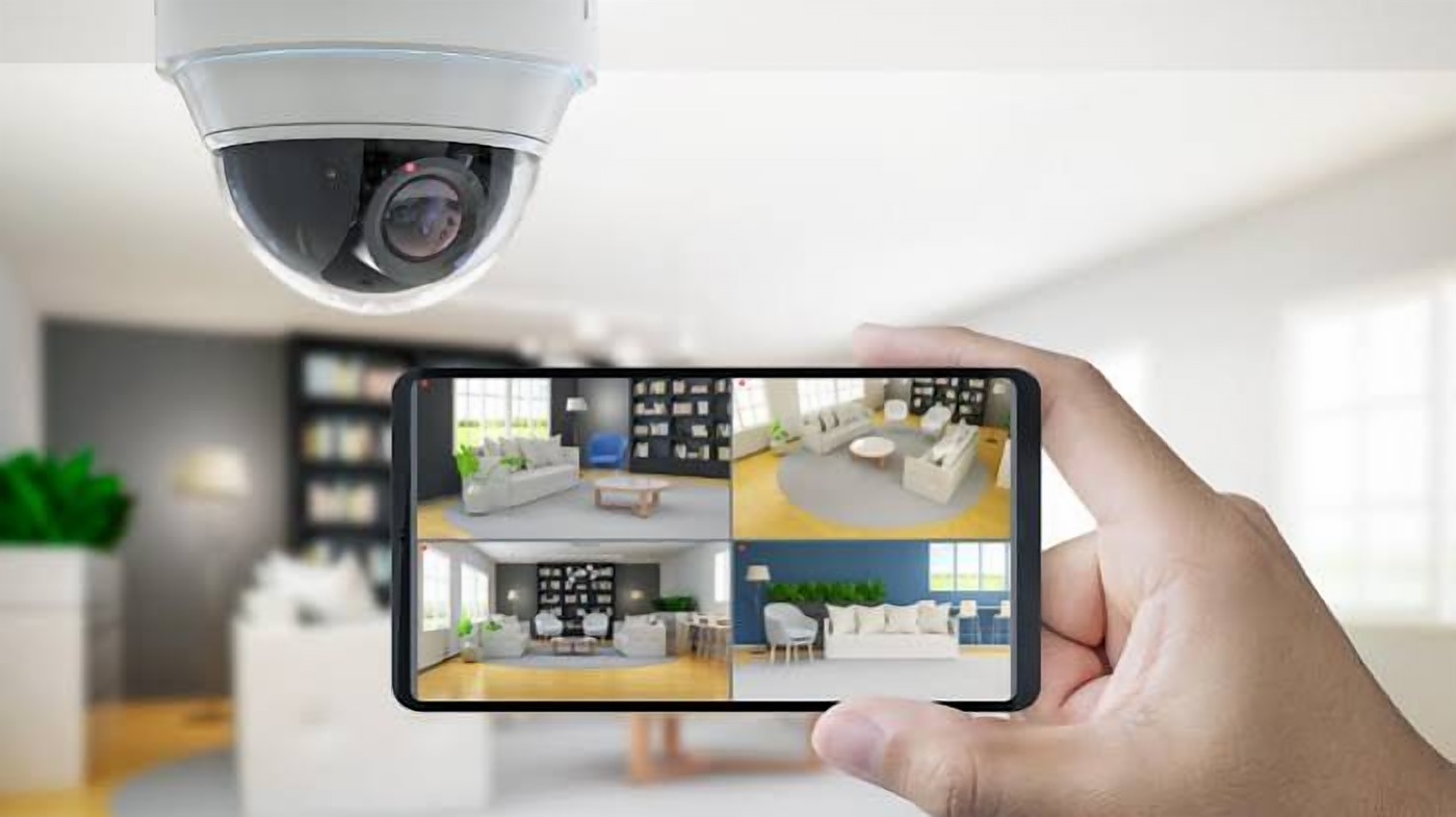 Dome CCTV camera with live camera feed on a phone